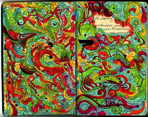 Photo of a highly decorated page from a Moleskine notebook